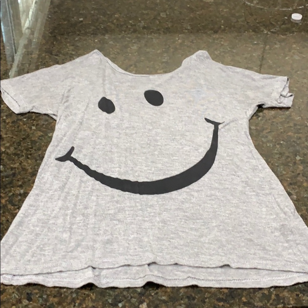 Gray graphic tee.